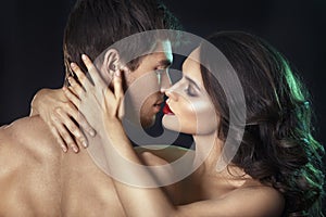 beauty couple. Kissing couple portrait. Sensual brunette woman in underwear with young lover, passionate couple photo