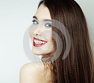 Beauty Girl with Red Lips and Nails. Provocative Make up. Luxury Woman with Blue Eyes. Fashion Brunette Portrait