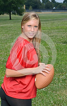 blonde woman American football player