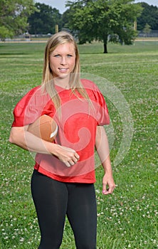 blonde woman American football player
