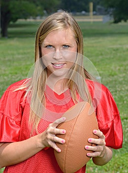 blonde woman American football player