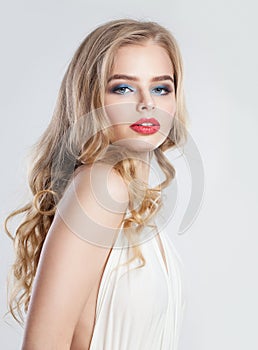 Sexy blonde woman with red lips makeup portrait