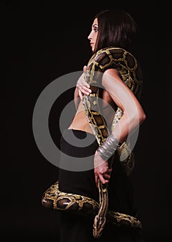 brunette holding python