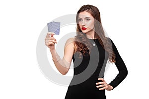 curly hair brunette posing with two aces cards in her hands, poker concept isolation on white background