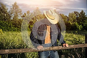 farmer or cowboy with unbuttoned shirt photo