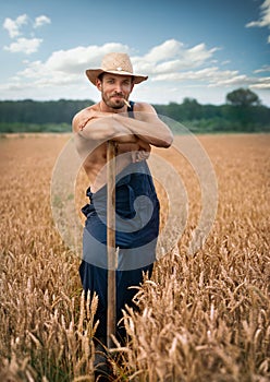 Sexy farmer with straw hat