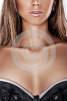 female breast in lace bra