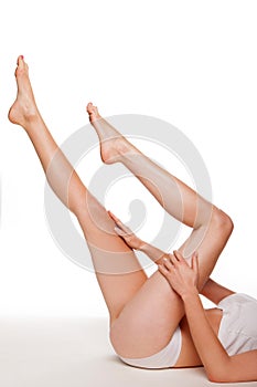 female legs in graceful pose photo