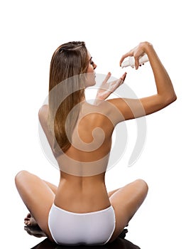 fit woman with moisturize