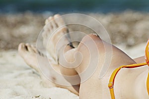 foot of a woman with anklet. photo