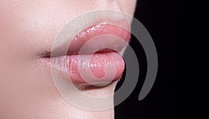 Sexy full lips. Gloss of lips and womans mouth. Sensual lips.