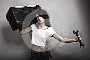 girl holding toolbox and wrench spanner