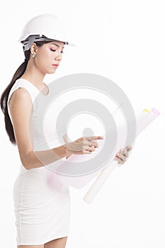 girl structural engineer looking at drafting paper