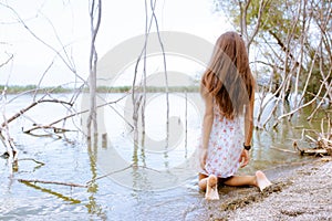 girl in tropical swamp environment