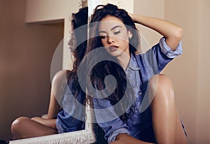 girl wearing lingerie and jeans shirt posing in bathroom