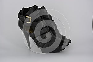 Sexy glamorous black women`s sandals from genuine cowhide matte leather on high heels