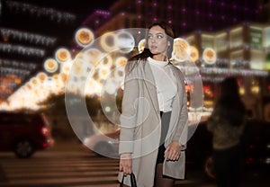 Sexy gorgeous brunette girl portrait in night city lights. Vogue fashion style portrait of young pretty beautiful woman