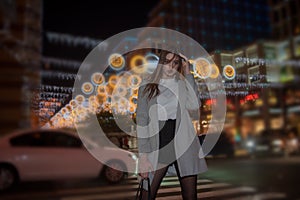 Sexy gorgeous brunette girl portrait in night city lights. Vogue fashion style portrait of young pretty beautiful woman