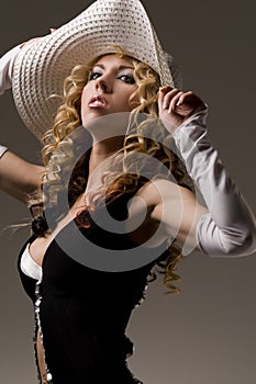 lady with white hat and black dress