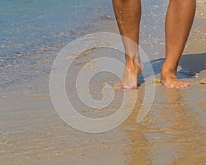 legs on the beach. Walking female feet