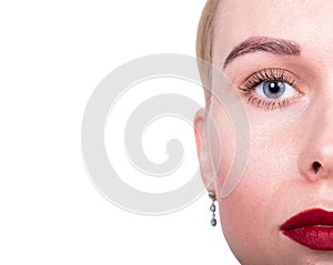 Lips. Beauty Red Lip Makeup Detail. Beauty Model Woman's Face close-up. half of the face and space for notes