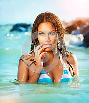 Model Girl Swimming and Posing