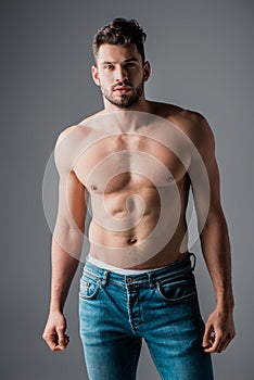 Sexy muscular man in jeans isolated