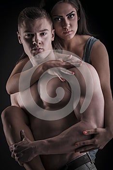 muscular naked man and female hands