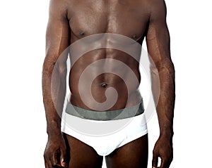 naked young man posing in underwear