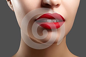 Sexy Part of Female Face with Plump Red Lips, Perfect Chin Shapes and Smooth Skin. Fashion Lip Make-up