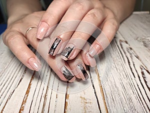 sexy pink manicure on long beautiful nails