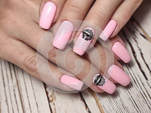 sexy pink manicure on long beautiful nails