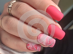 sexy pink manicure on long beautiful nails