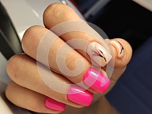 sexy pink manicure on long beautiful nails