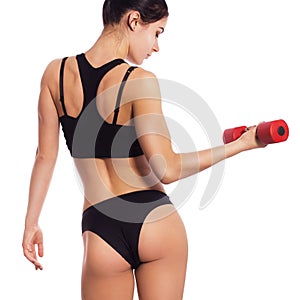 slim fit woman body with dumbbells. Muscled back. Sportswea