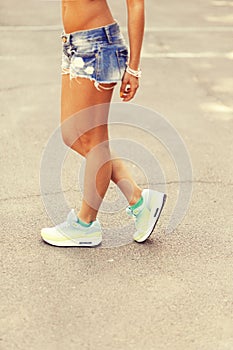 tanned woman legs close up