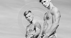 Sexy torso attractive body. Masculinity concept. Men strong muscular athlete bodybuilder. Attractive muscular twins