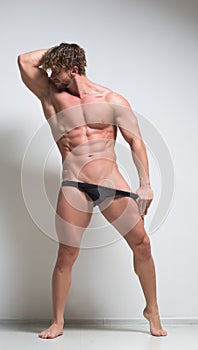 very muscular male model in underwear