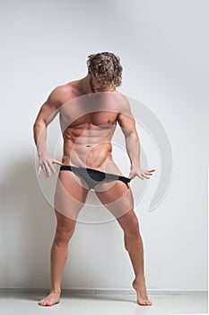 very muscular male model in underwear photo