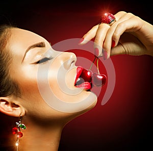 Woman Eating Cherry photo