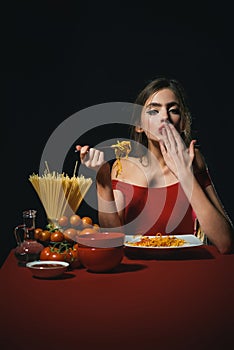 Sexy woman eating Italian pasta spaghetti. Hunger, appetite and recipe. Delicious pasta. Italian pasta. Spaghetti love