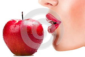 woman eating red apple, sensual red lips