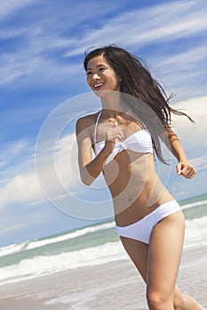 Woman Girl in Bikini Running on Beach