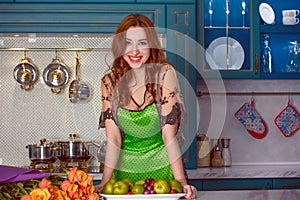 Woman in elegant style on vintage luxury kitchen interior