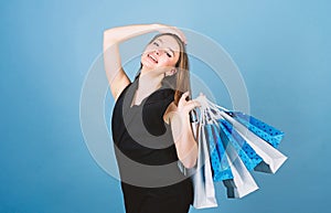 Sexy woman with long hair at shopping. shopping bag. Big sale. sensual woman hold purchase package. fashion and beauty