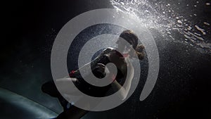Sexy woman is posing underwater, fashion model, subaquatic shot