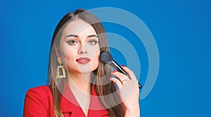 Sexy woman with professional makeup brush tool. beauty and fashion. hair beauty and hairdresser salon. jewelry earrings