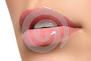 woman's lips. Beauty lips make-up. Beautiful make-up. Sensual open mouth. Lipstick and lip gloss. Natural full lips