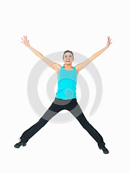 woman showing fitness moves, white background photo