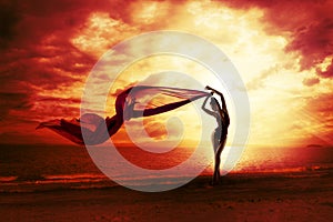 Woman Silhouette over Red Sunset Sky, Sensual Female Beach photo